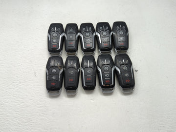 Lot of 10 Ford Keyless Entry Remote Fob MIXED FCC IDS MIXED PART NUMBERS 1476404 - Oemusedautoparts1.com