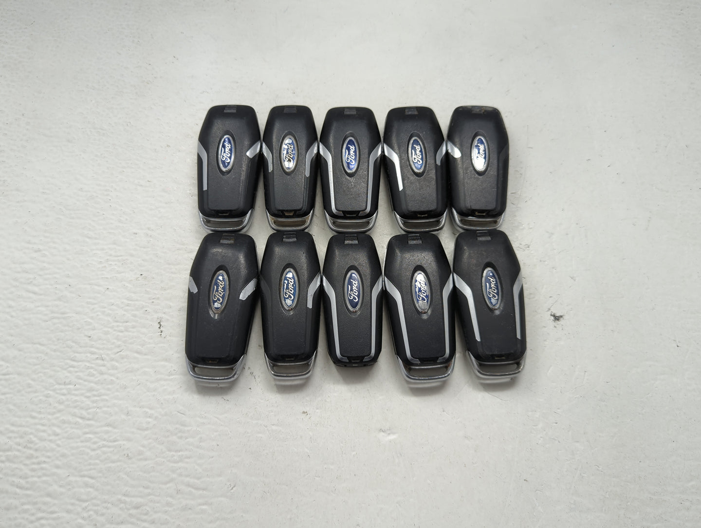 Lot of 10 Ford Keyless Entry Remote Fob MIXED FCC IDS MIXED PART NUMBERS 1476404 - Oemusedautoparts1.com