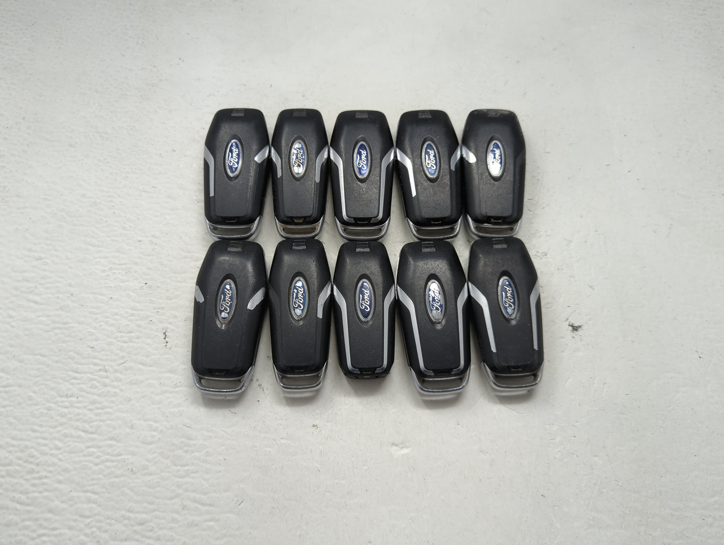 Lot of 10 Ford Keyless Entry Remote Fob MIXED FCC IDS MIXED PART NUMBERS 1476404 - Oemusedautoparts1.com