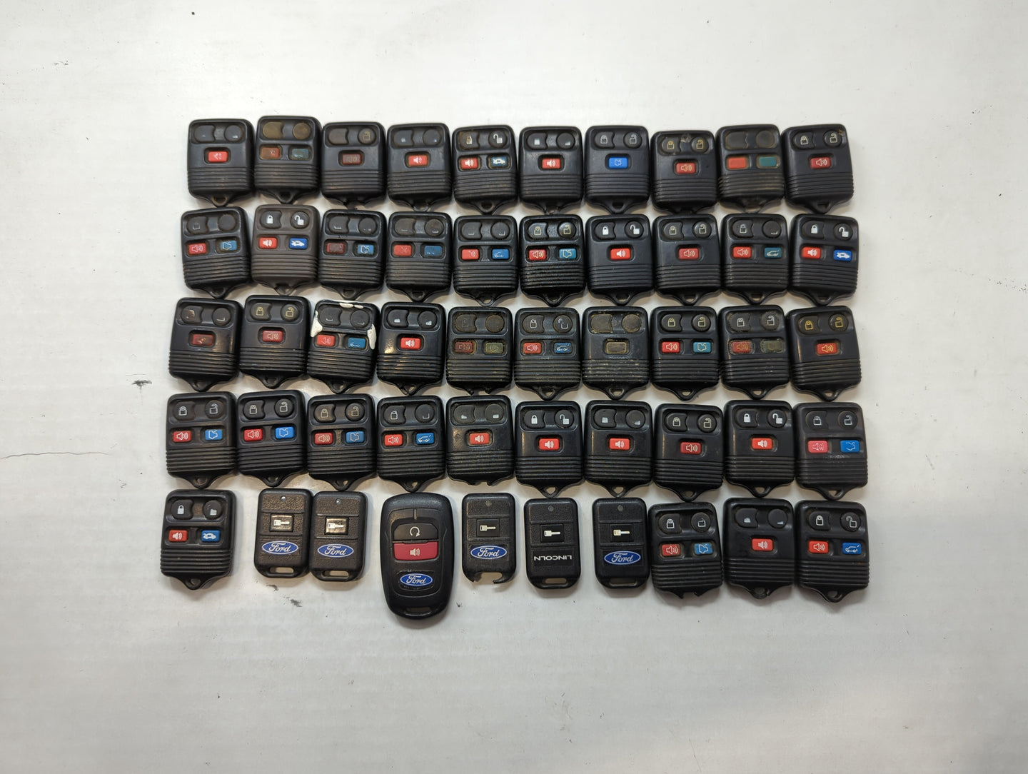 Lot of 50 Ford Keyless Entry Remote Fob MIXED FCC IDS MIXED PART NUMBERS - Oemusedautoparts1.com