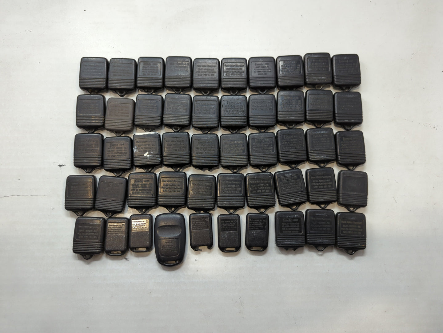 Lot of 50 Ford Keyless Entry Remote Fob MIXED FCC IDS MIXED PART NUMBERS - Oemusedautoparts1.com