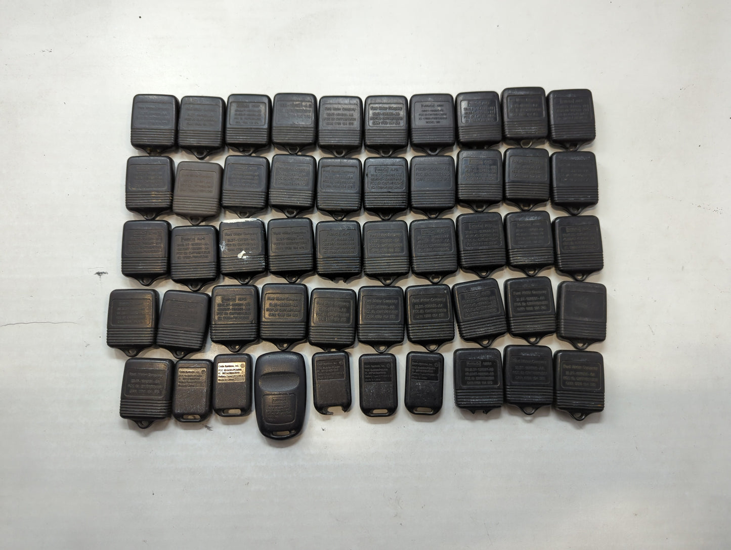 Lot of 50 Ford Keyless Entry Remote Fob MIXED FCC IDS MIXED PART NUMBERS - Oemusedautoparts1.com