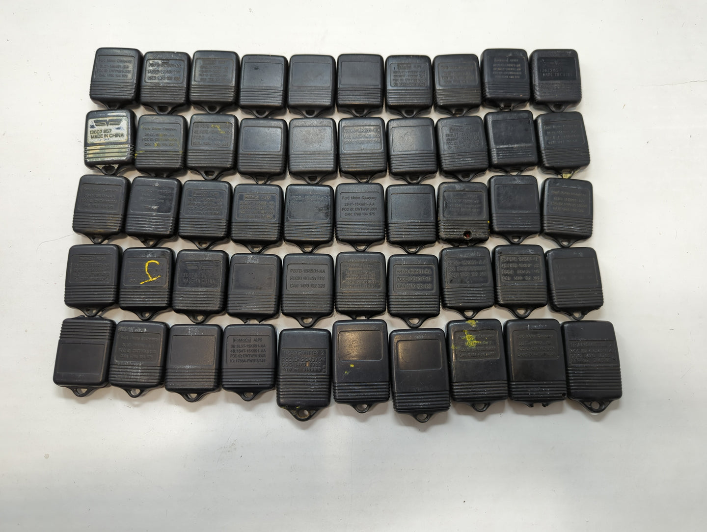 Lot of 50 Ford Keyless Entry Remote Fob MIXED FCC IDS MIXED PART NUMBERS - Oemusedautoparts1.com