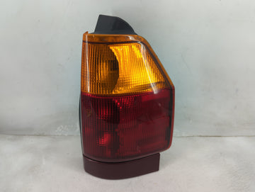 2002-2009 Gmc Envoy Tail Light Assembly Passenger Right OEM Fits Fits 2002 2003 2004 2005 2006 2007 2008 2009 OEM Used Auto 