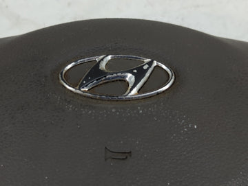 2006-2007 Hyundai Accent Air Bag Driver Left Steering Wheel Mounted Grey - Oemusedautoparts1.com