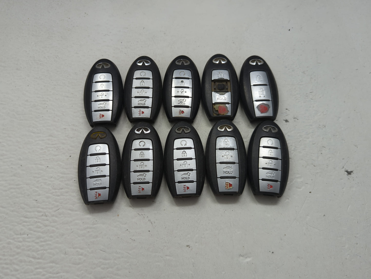 Lot of 10 Infiniti Keyless Entry Remote Fob MIXED FCC IDS MIXED PART 1475528 - Oemusedautoparts1.com