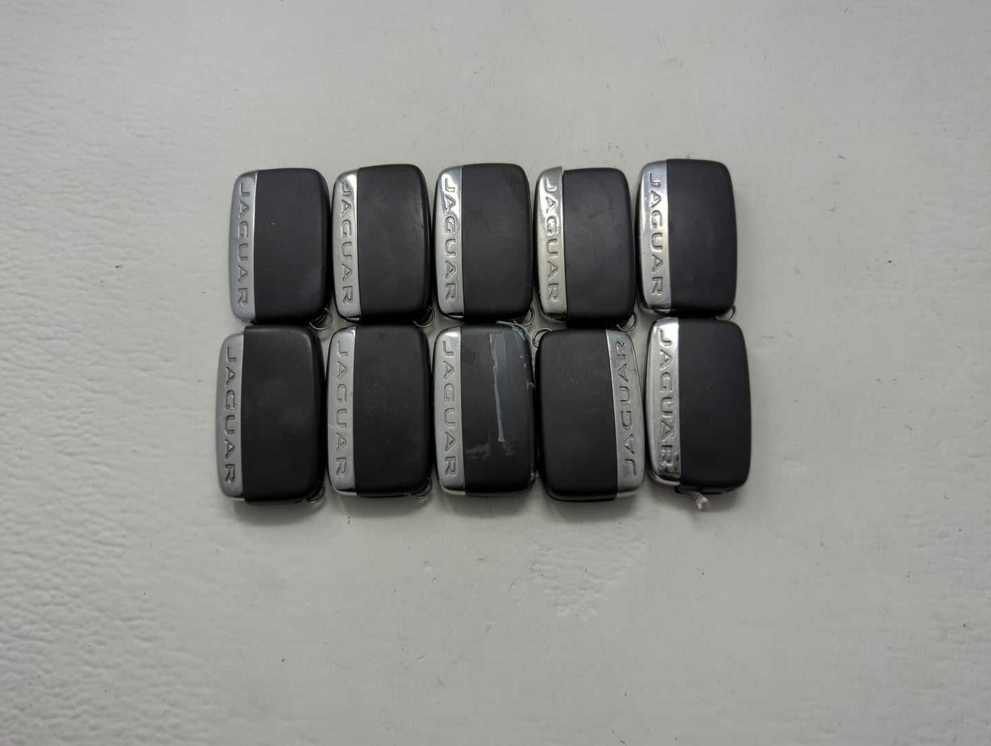 Lot of 10 Jaguar Keyless Entry Remote Fob MIXED FCC IDS MIXED PART - Oemusedautoparts1.com