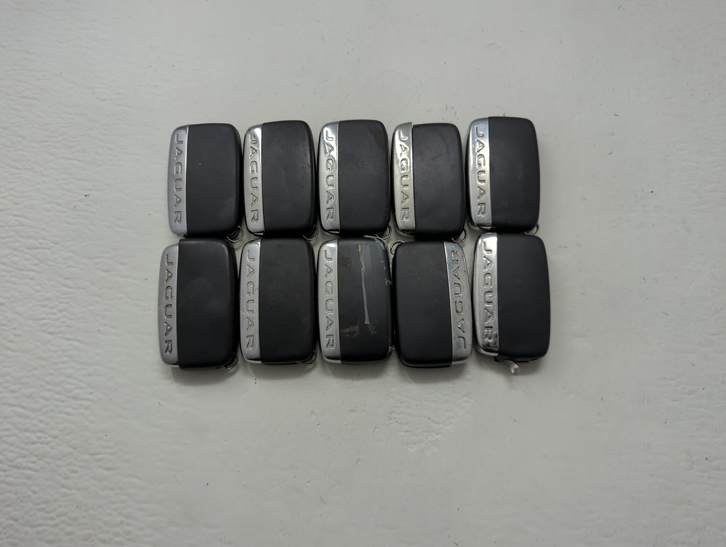 Lot of 10 Jaguar Keyless Entry Remote Fob MIXED FCC IDS MIXED PART - Oemusedautoparts1.com