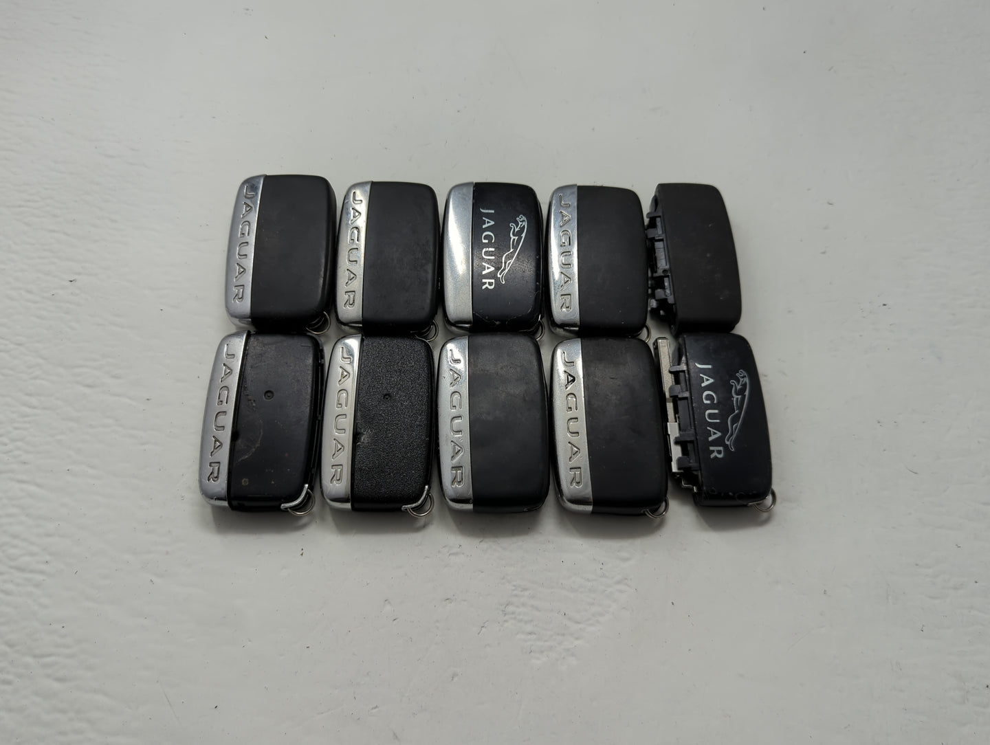Lot of 10 Jaguar Keyless Entry Remote Fob MIXED FCC IDS MIXED PART - Oemusedautoparts1.com