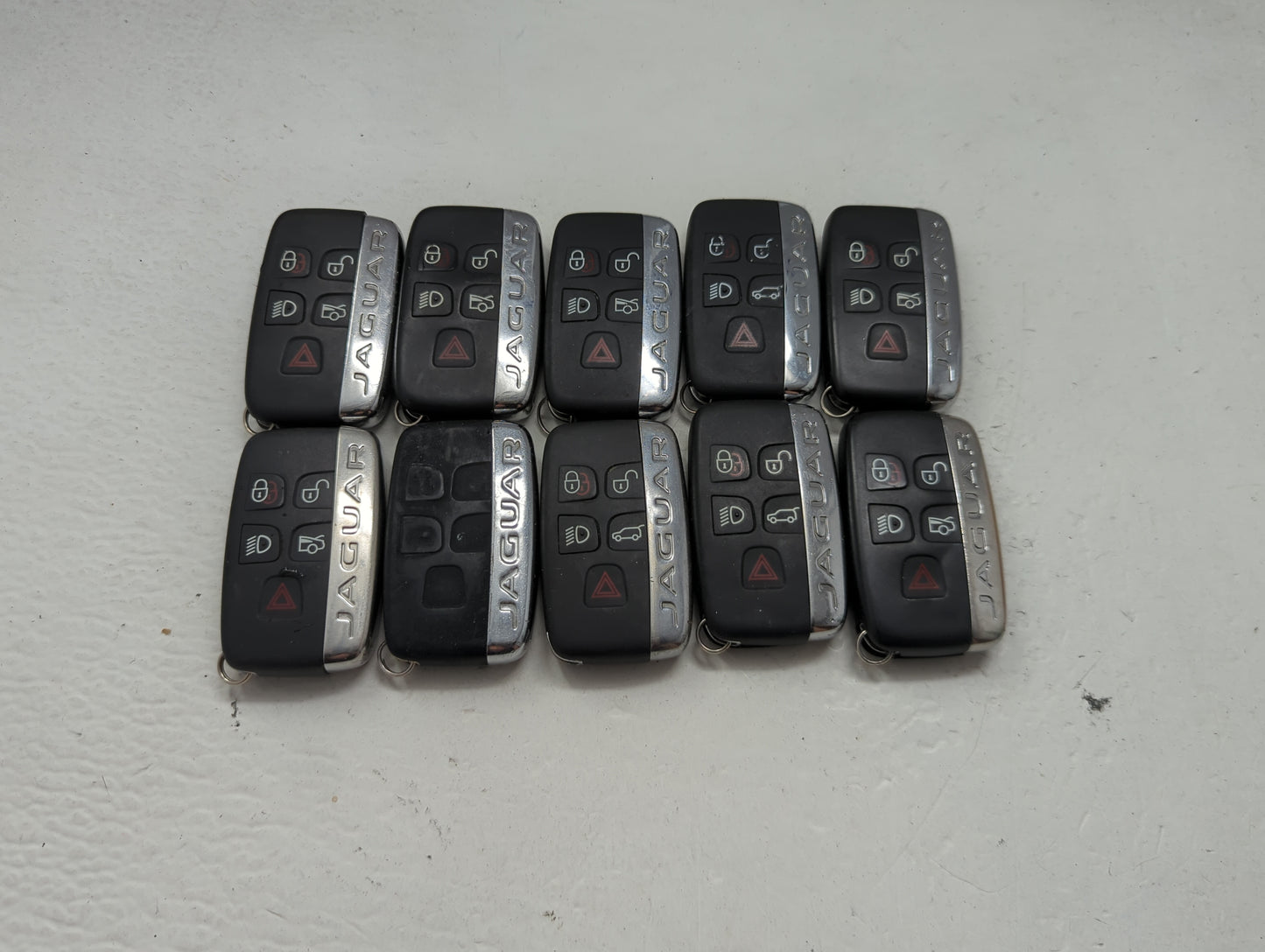 Lot of 10 Jaguar Keyless Entry Remote Fob MIXED FCC IDS MIXED PART 1474187 - Oemusedautoparts1.com