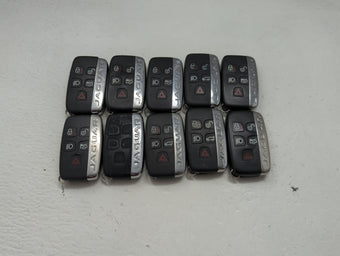 compare product Lot of 10 Jaguar Keyless Entry Remote Fob MIXED FCC IDS MIXED PART 1474187