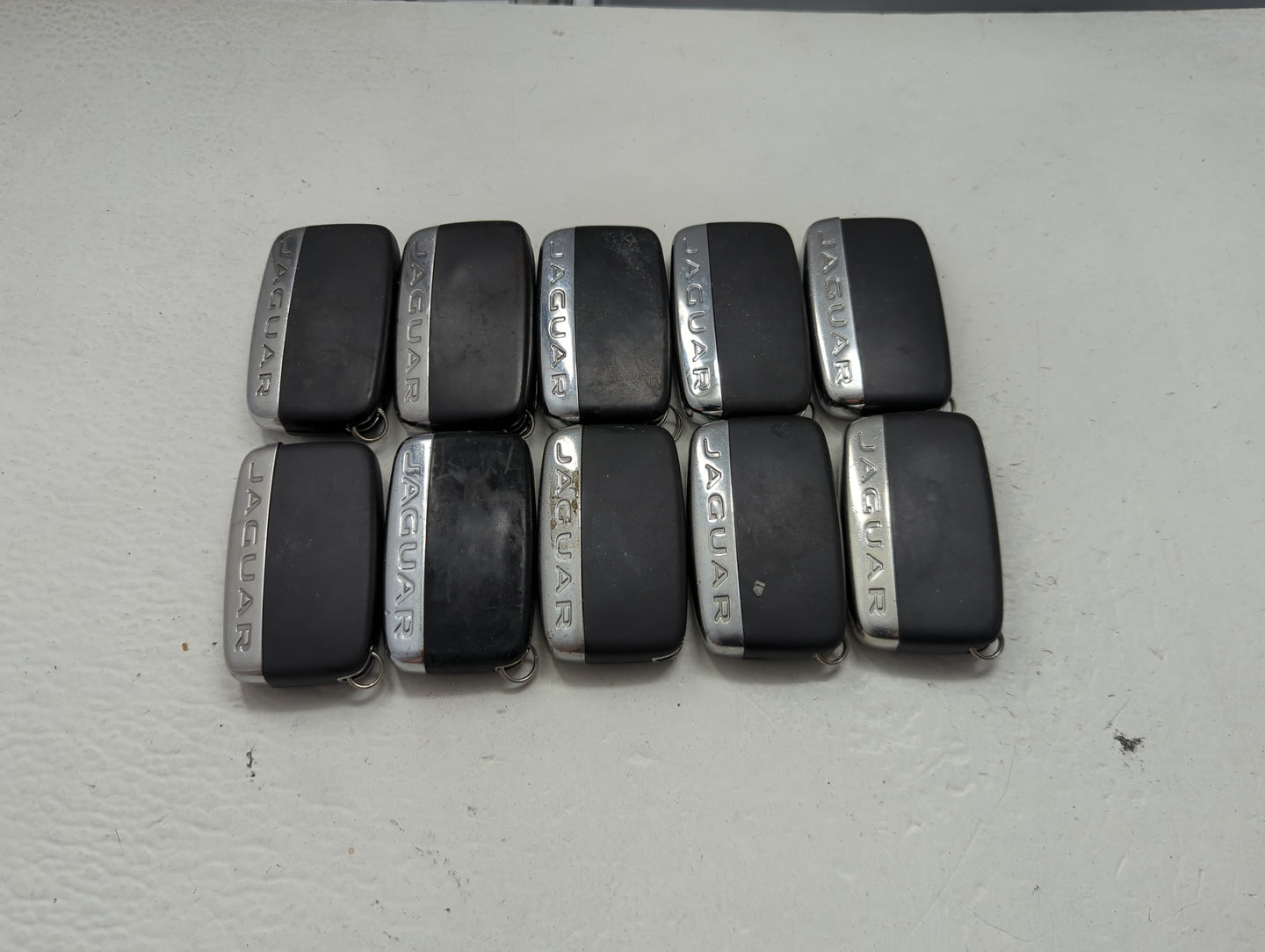 Lot of 10 Jaguar Keyless Entry Remote Fob MIXED FCC IDS MIXED PART 1474187 - Oemusedautoparts1.com