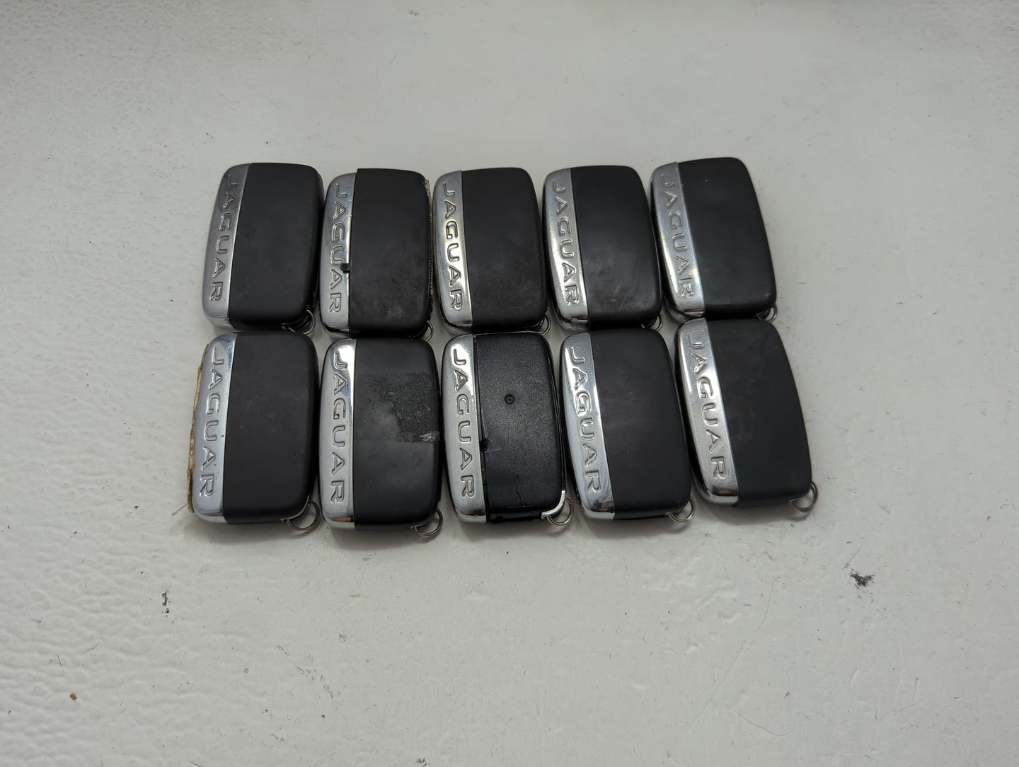 Lot of 10 Jaguar Keyless Entry Remote Fob MIXED FCC IDS MIXED PART 1474188 - Oemusedautoparts1.com
