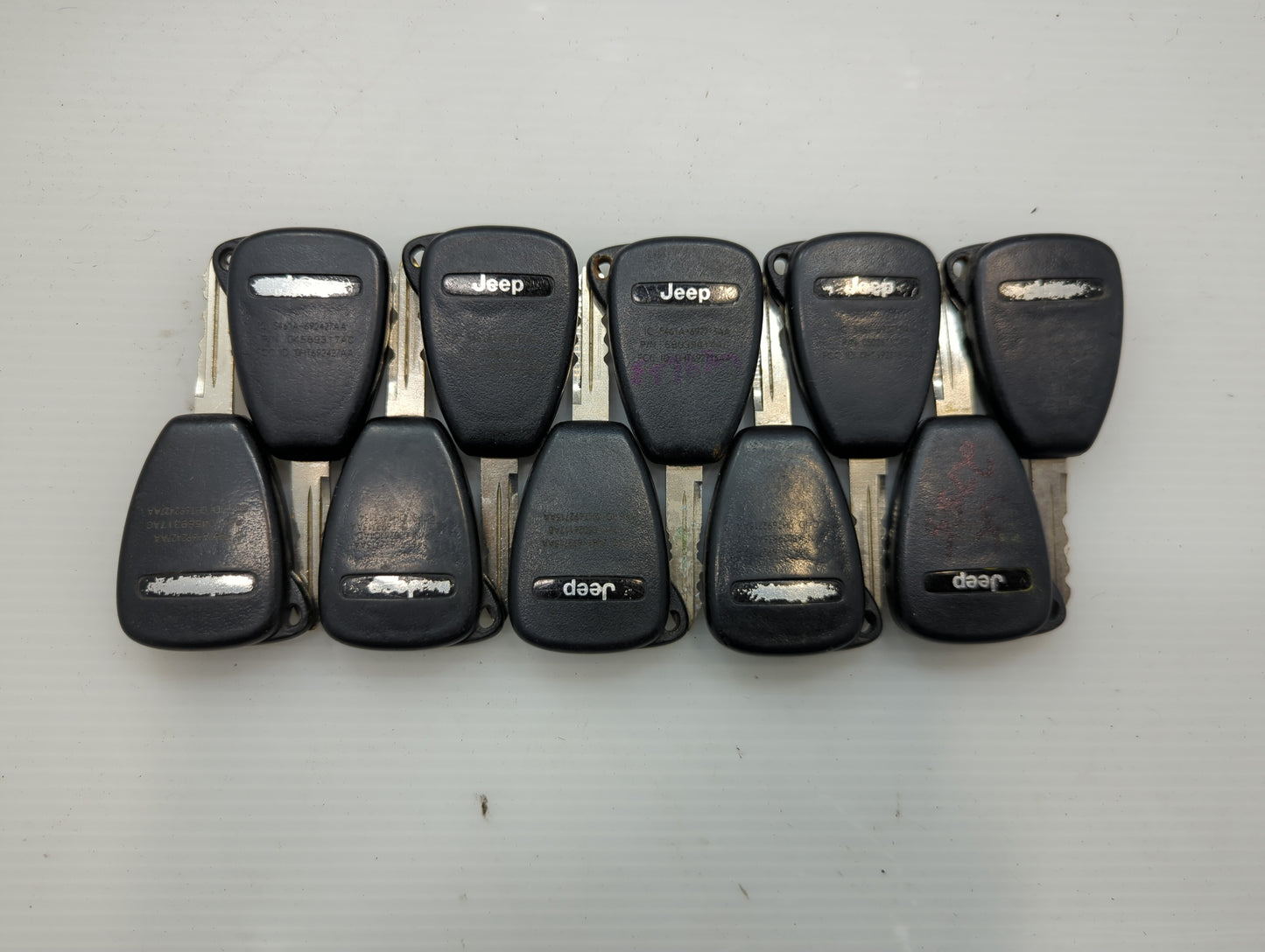 Lot of 10 Jeep Keyless Entry Remote Fob OHT691713AA | OHT692427AA MIXED - Oemusedautoparts1.com