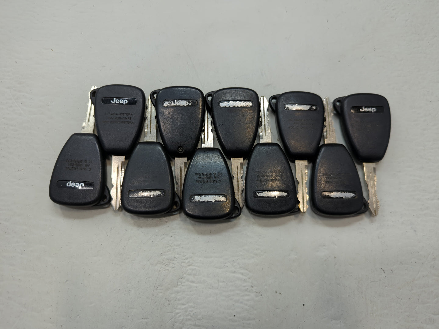 Lot of 10 Jeep Keyless Entry Remote Fob OHT691713AA | OHT692715AA | - Oemusedautoparts1.com