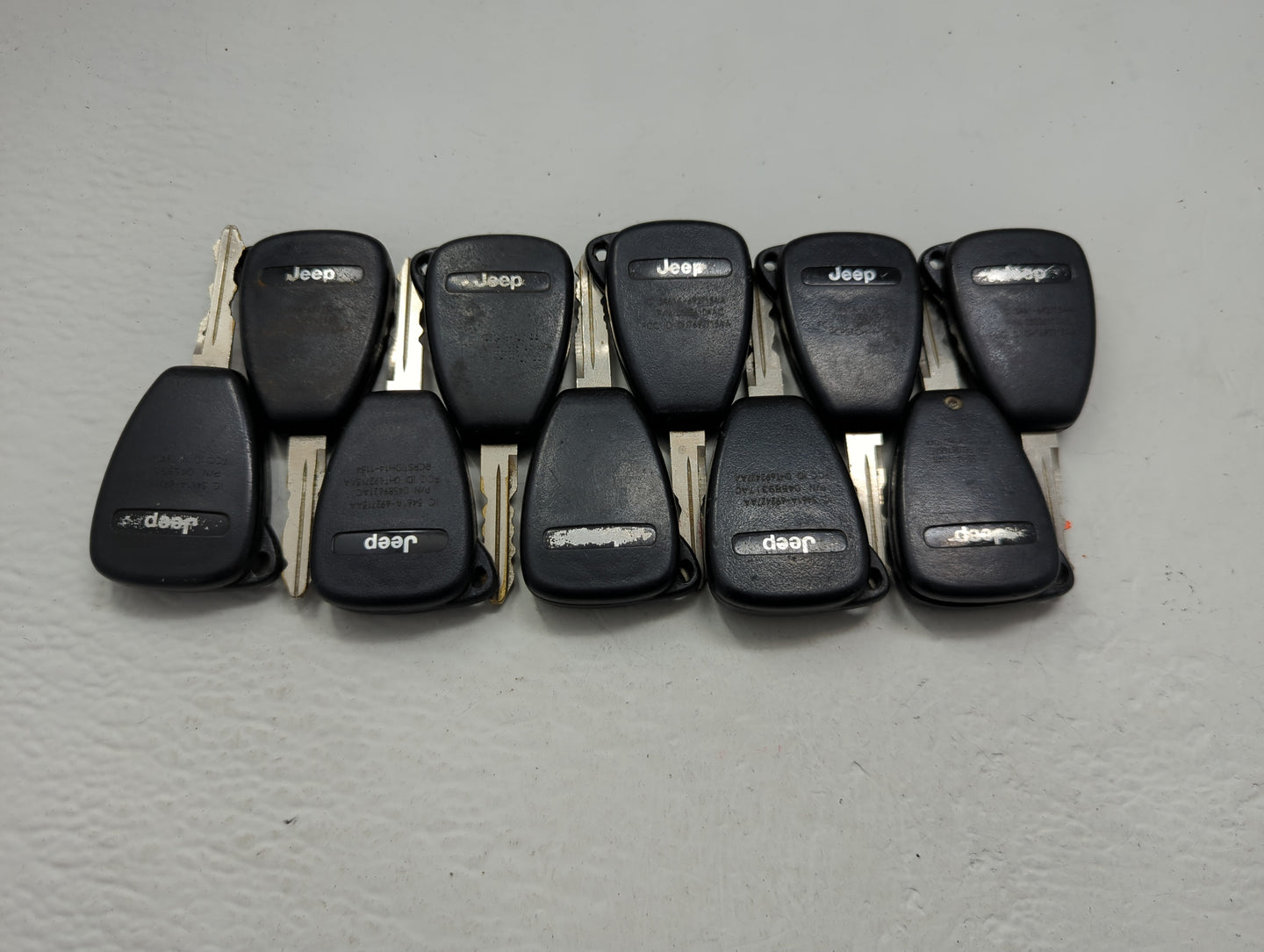 Lot of 10 Jeep Keyless Entry Remote Fob OHT691713AA | OHT692427AA | - Oemusedautoparts1.com