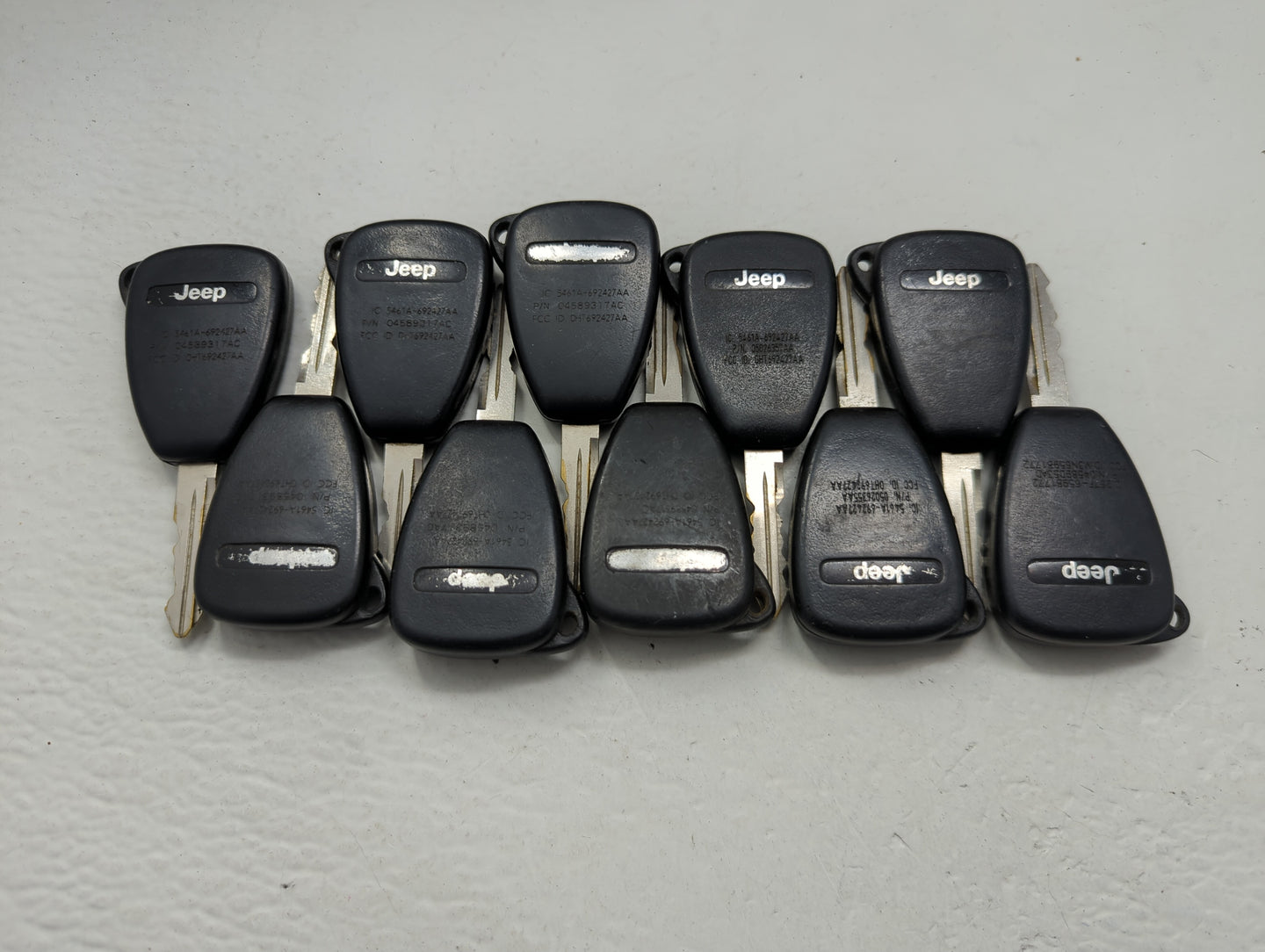 Lot of 10 Jeep Keyless Entry Remote Fob OHT692427AA | OHT692715AA | - Oemusedautoparts1.com