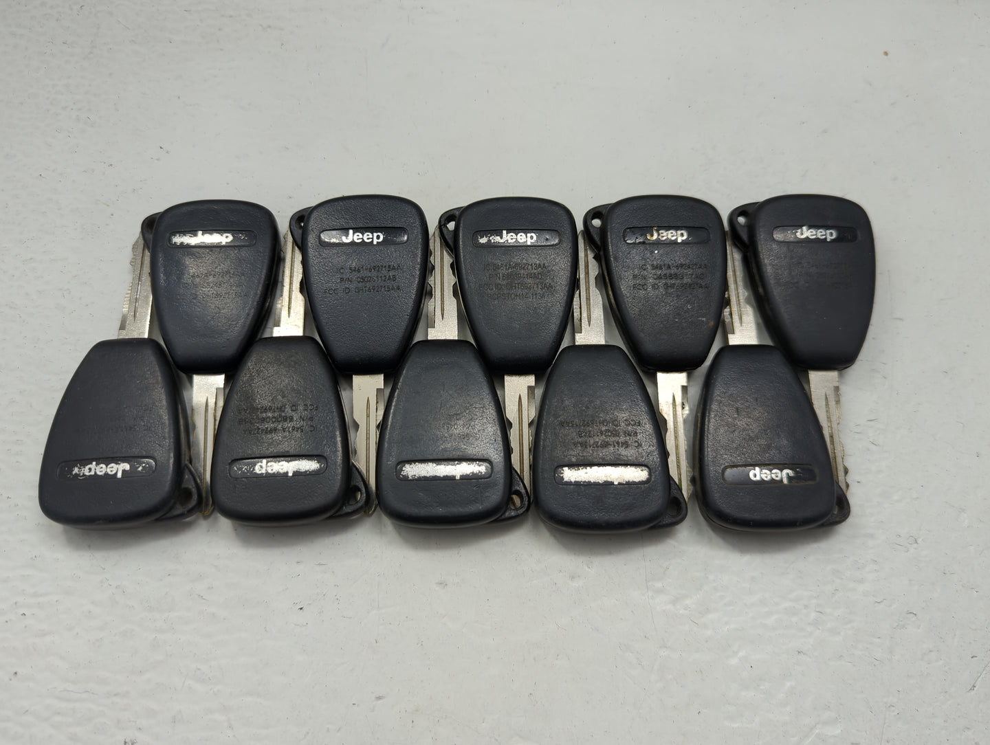 Lot of 10 Jeep Keyless Entry Remote Fob OHT691713AA | OHT6924727AA - Oemusedautoparts1.com