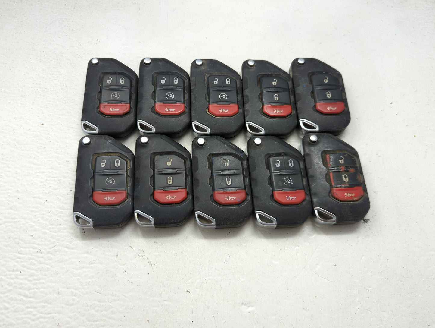 Lot of 10 Jeep Keyless Entry Remote Fob MIXED FCC IDS 1475697 - Oemusedautoparts1.com