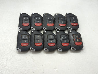 compare product Lot of 10 Jeep Keyless Entry Remote Fob MIXED FCC IDS 1475697