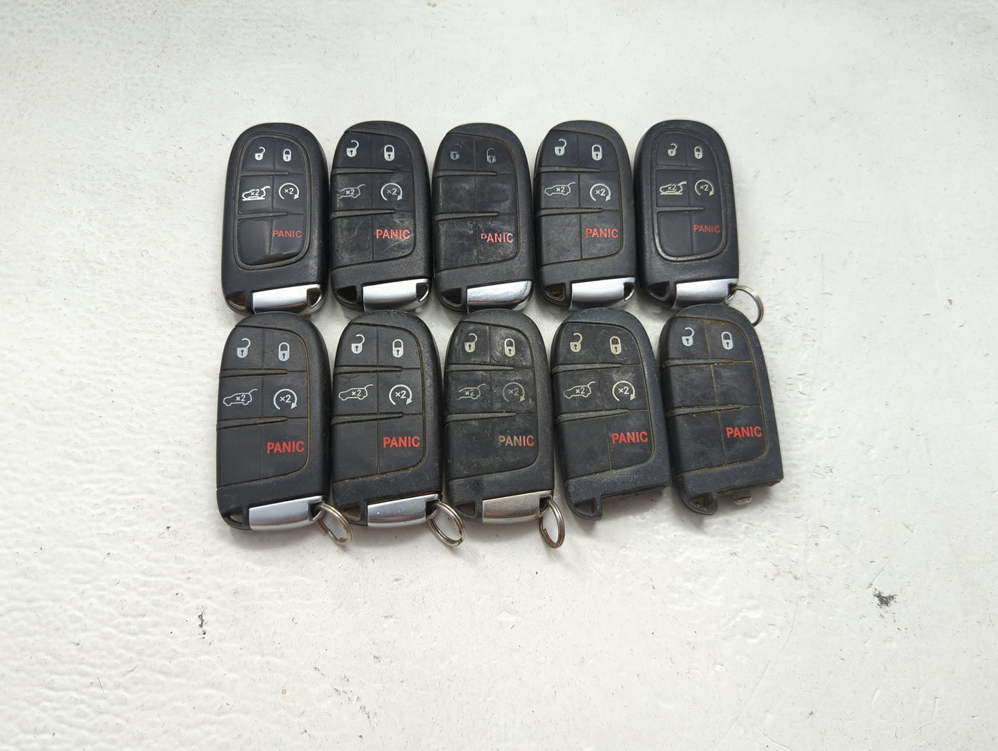 Lot of 10 Jeep Keyless Entry Remote Fob MIXED FCC IDS MIXED PART NUMBERS 1475784 - Oemusedautoparts1.com
