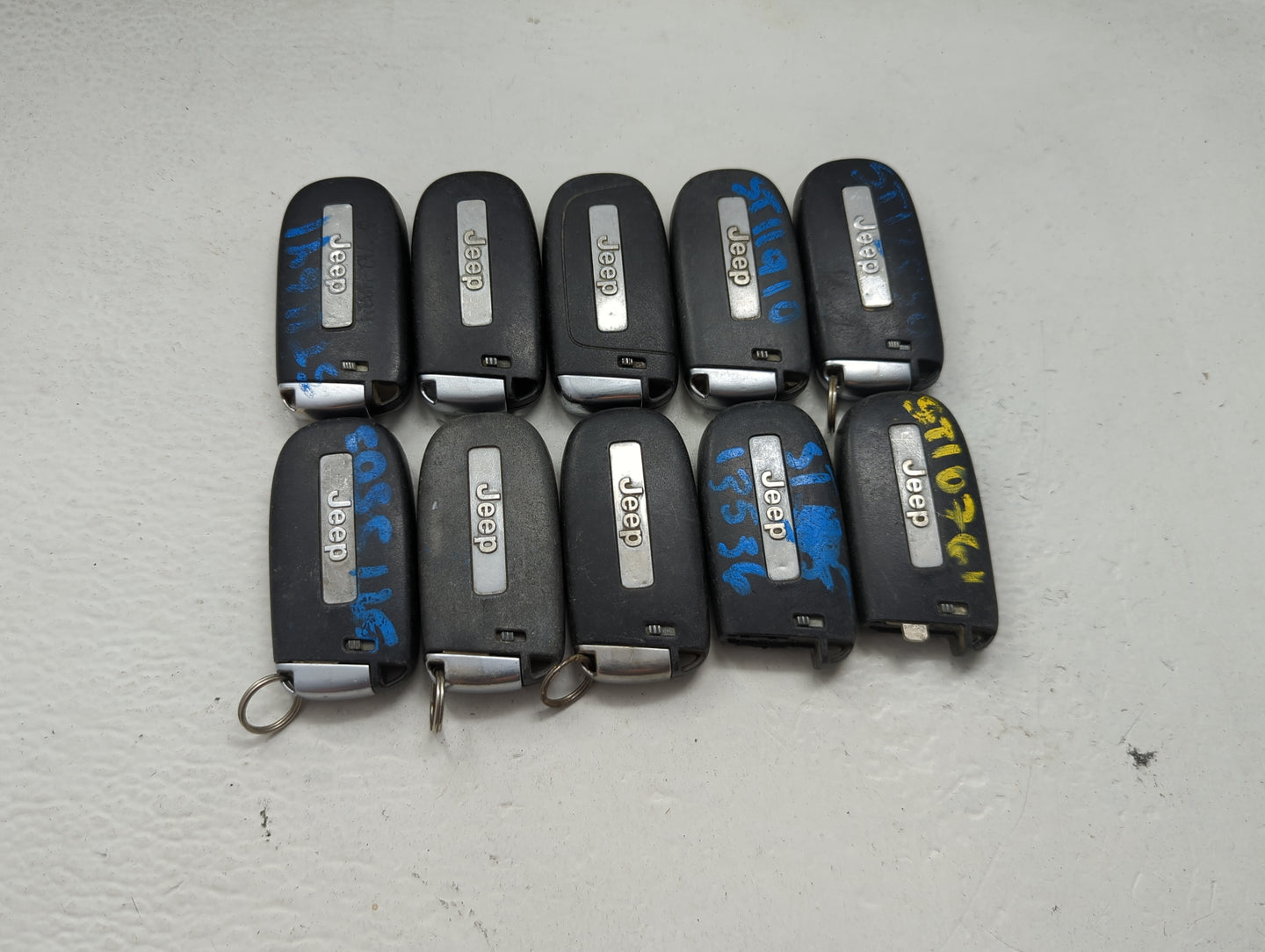 Lot of 10 Jeep Keyless Entry Remote Fob MIXED FCC IDS MIXED PART NUMBERS 1475784 - Oemusedautoparts1.com