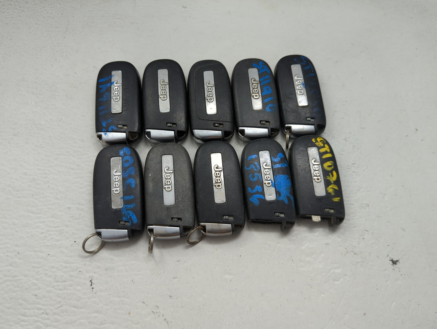 Lot of 10 Jeep Keyless Entry Remote Fob MIXED FCC IDS MIXED PART NUMBERS 1475784 - Oemusedautoparts1.com
