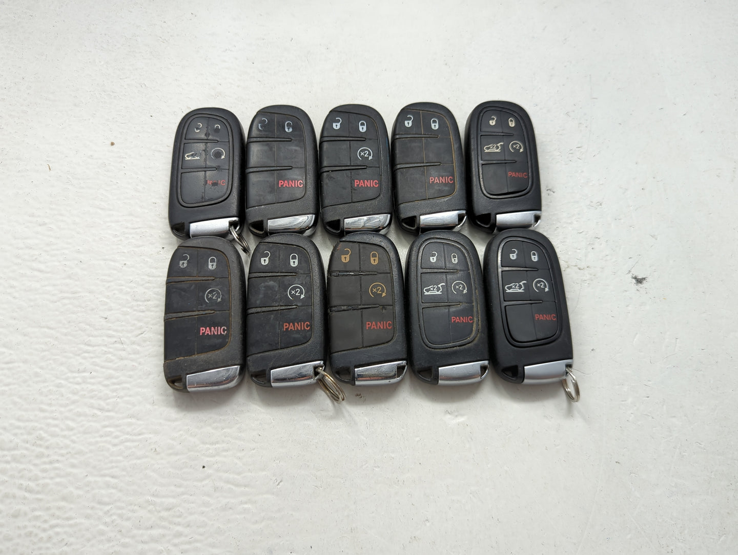 Lot of 10 Jeep Keyless Entry Remote Fob MIXED FCC IDS MIXED PART NUMBERS 1475795 - Oemusedautoparts1.com