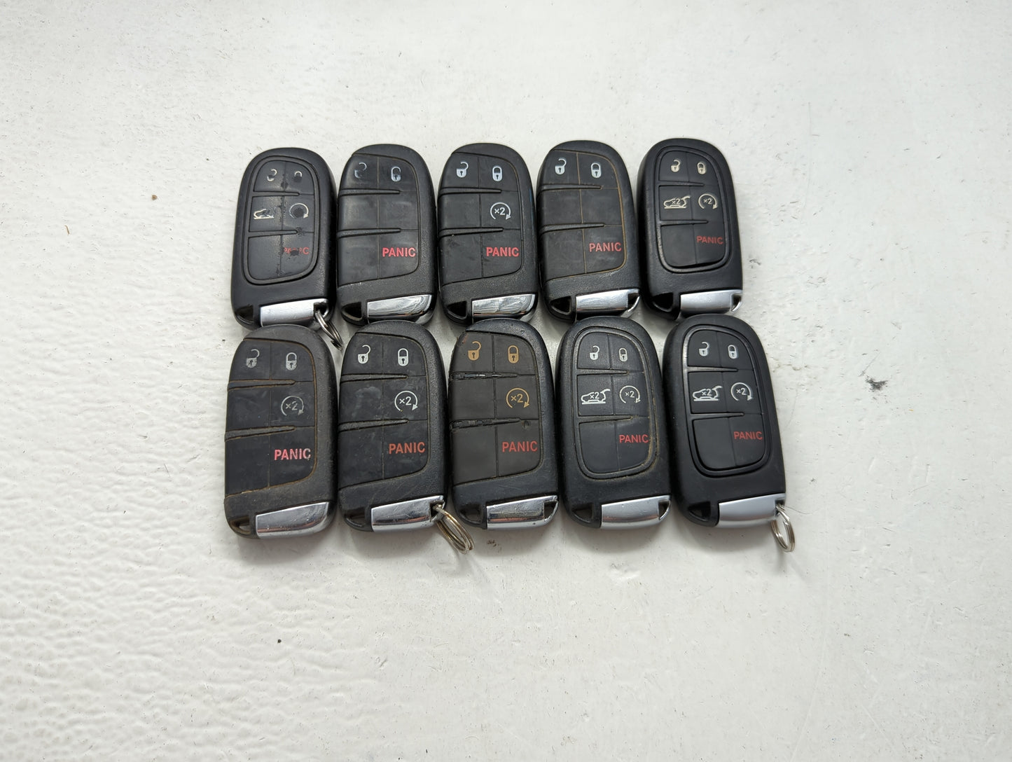 Lot of 10 Jeep Keyless Entry Remote Fob MIXED FCC IDS MIXED PART NUMBERS 1475795 - Oemusedautoparts1.com