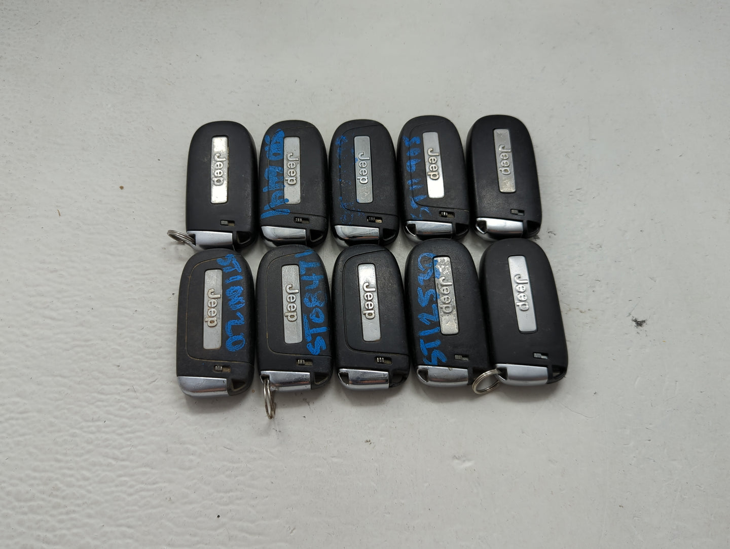 Lot of 10 Jeep Keyless Entry Remote Fob MIXED FCC IDS MIXED PART NUMBERS 1475795 - Oemusedautoparts1.com