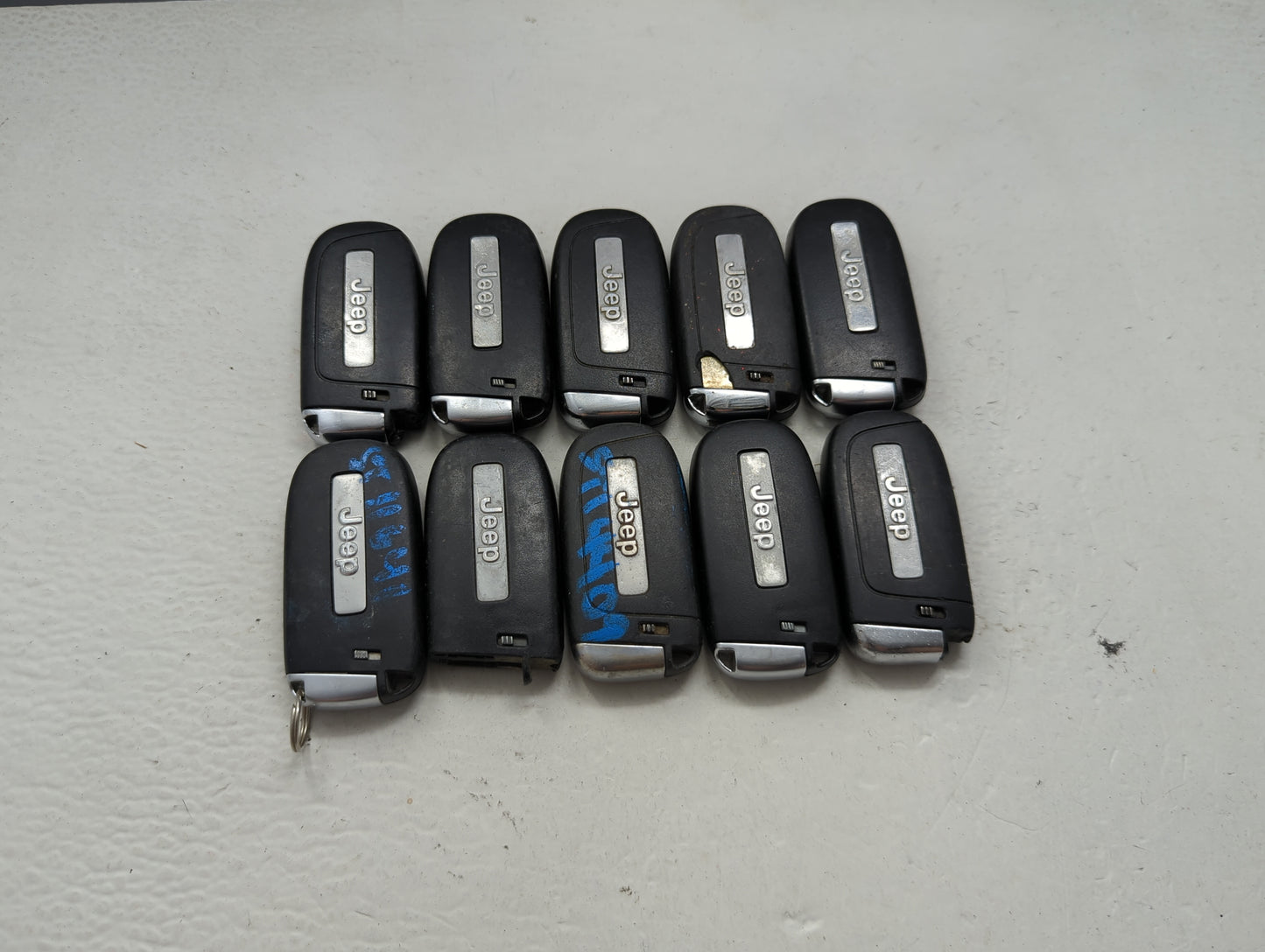 Lot of 10 Jeep Keyless Entry Remote Fob MIXED FCC IDS MIXED PART NUMBERS 1475796 - Oemusedautoparts1.com