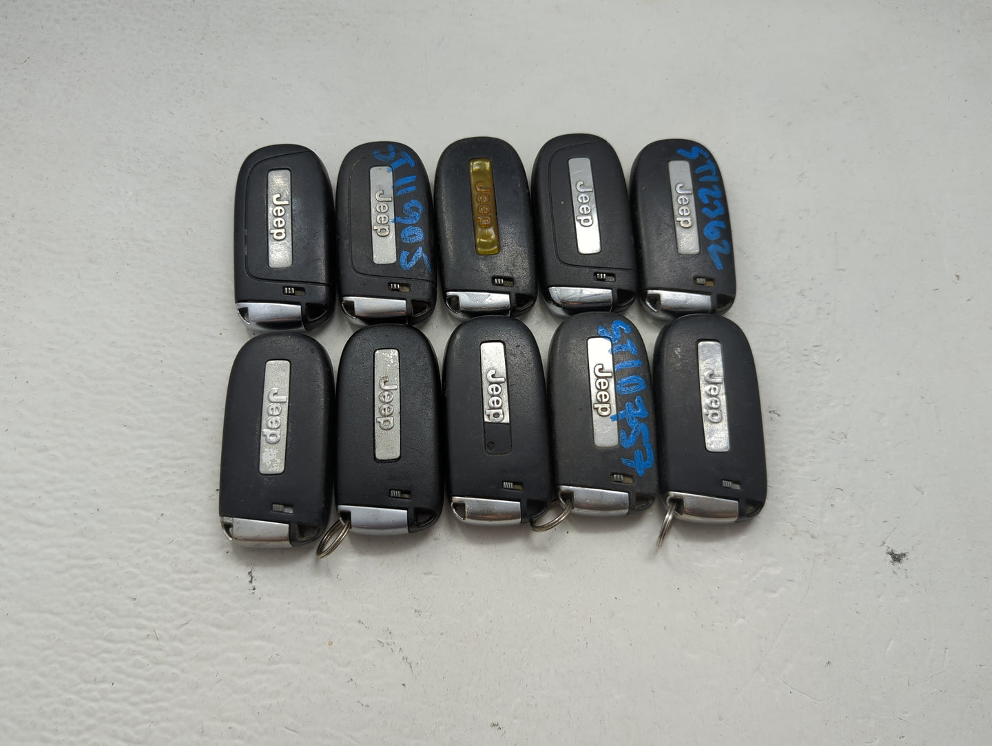 Lot of 10 Jeep Keyless Entry Remote Fob MIXED FCC IDS MIXED PART NUMBERS 1475797 - Oemusedautoparts1.com
