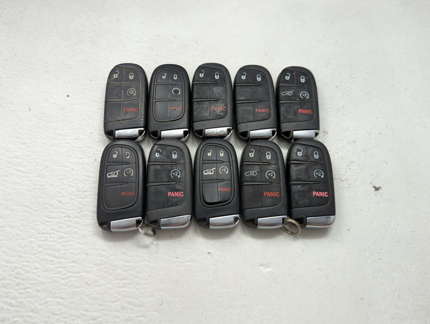Lot of 10 Jeep Keyless Entry Remote Fob MIXED FCC IDS MIXED PART NUMBERS 1475798 - Oemusedautoparts1.com
