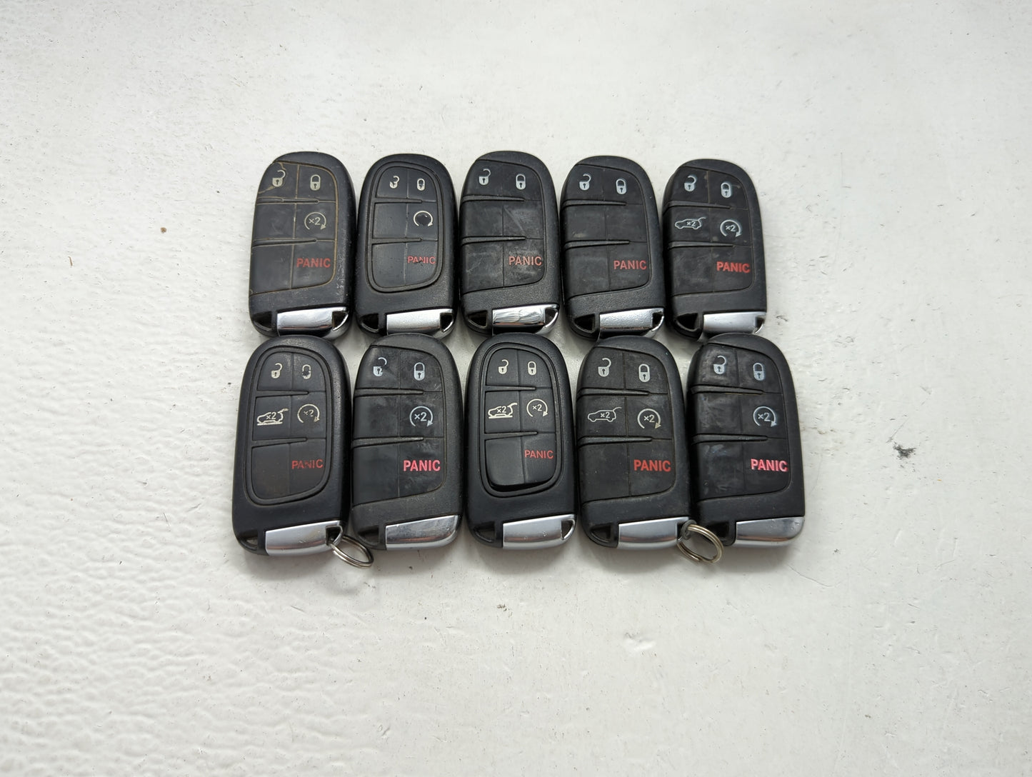 Lot of 10 Jeep Keyless Entry Remote Fob MIXED FCC IDS MIXED PART NUMBERS 1475798 - Oemusedautoparts1.com