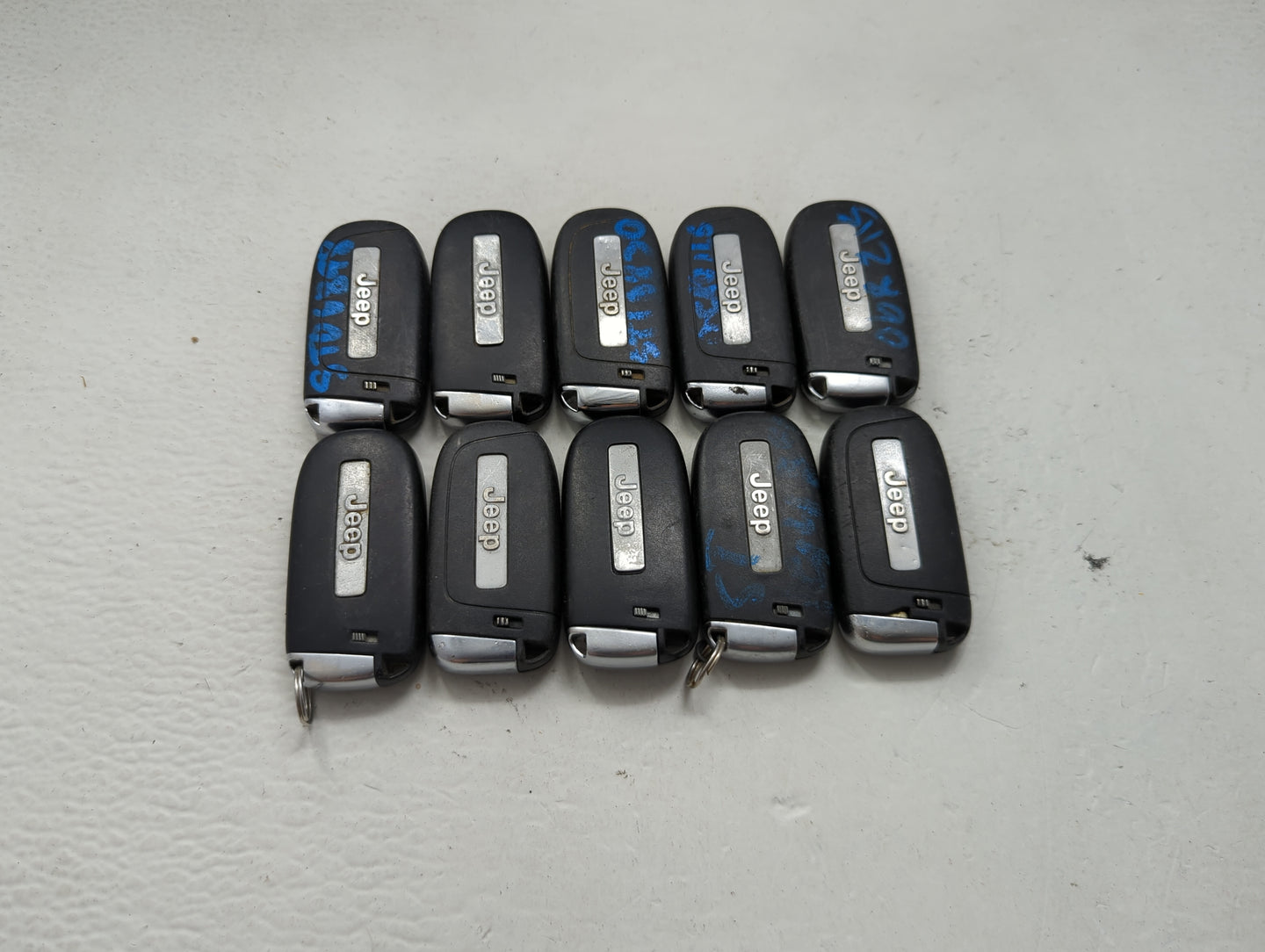 Lot of 10 Jeep Keyless Entry Remote Fob MIXED FCC IDS MIXED PART NUMBERS 1475798 - Oemusedautoparts1.com