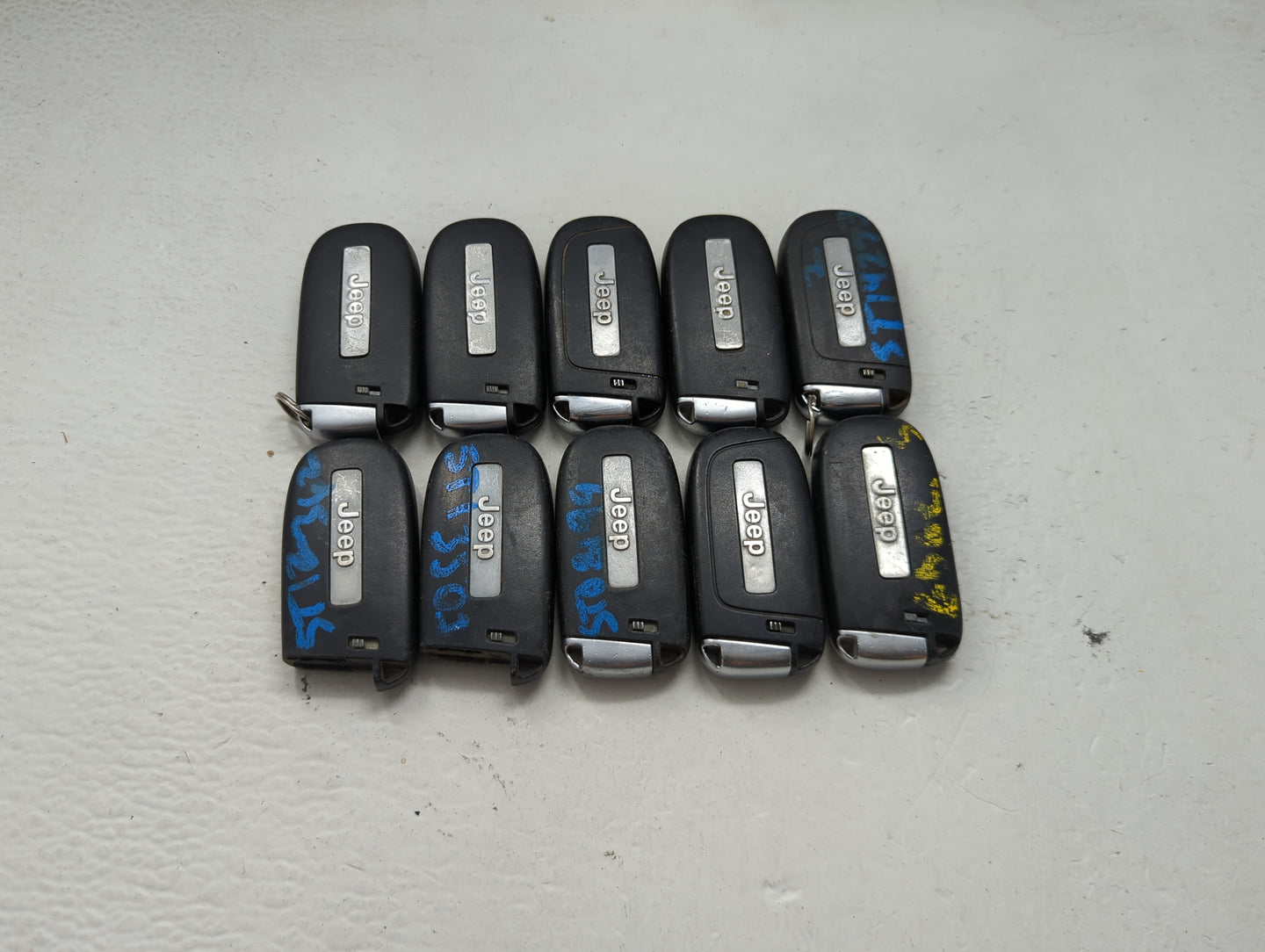 Lot of 10 Jeep Keyless Entry Remote Fob MIXED FCC IDS MIXED PART NUMBERS 1475799 - Oemusedautoparts1.com