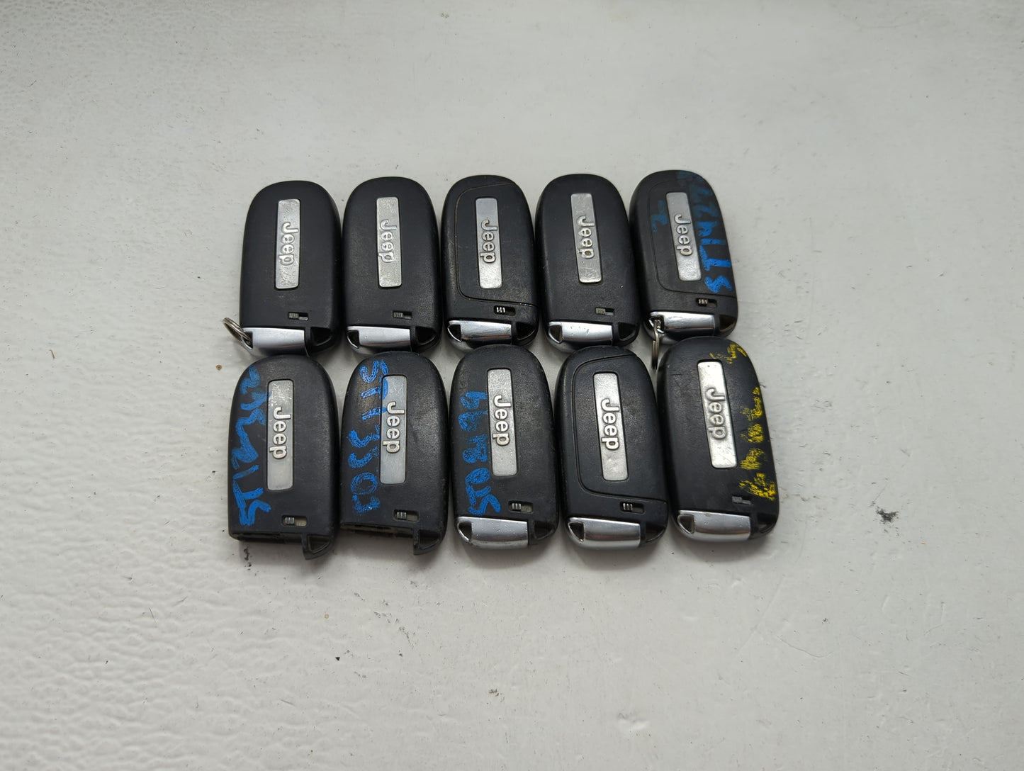 Lot of 10 Jeep Keyless Entry Remote Fob MIXED FCC IDS MIXED PART NUMBERS 1475799 - Oemusedautoparts1.com