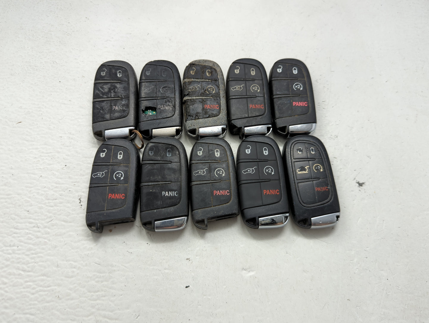 Lot of 10 Jeep Keyless Entry Remote Fob MIXED FCC IDS MIXED PART NUMBERS 1475800 - Oemusedautoparts1.com