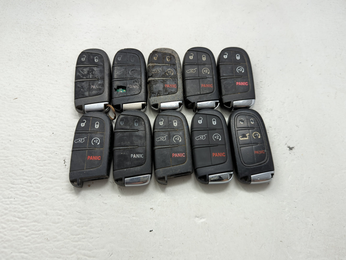 Lot of 10 Jeep Keyless Entry Remote Fob MIXED FCC IDS MIXED PART NUMBERS 1475800 - Oemusedautoparts1.com