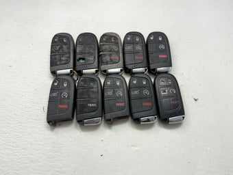 compare product Lot of 10 Jeep Keyless Entry Remote Fob MIXED FCC IDS MIXED PART NUMBERS 1475800