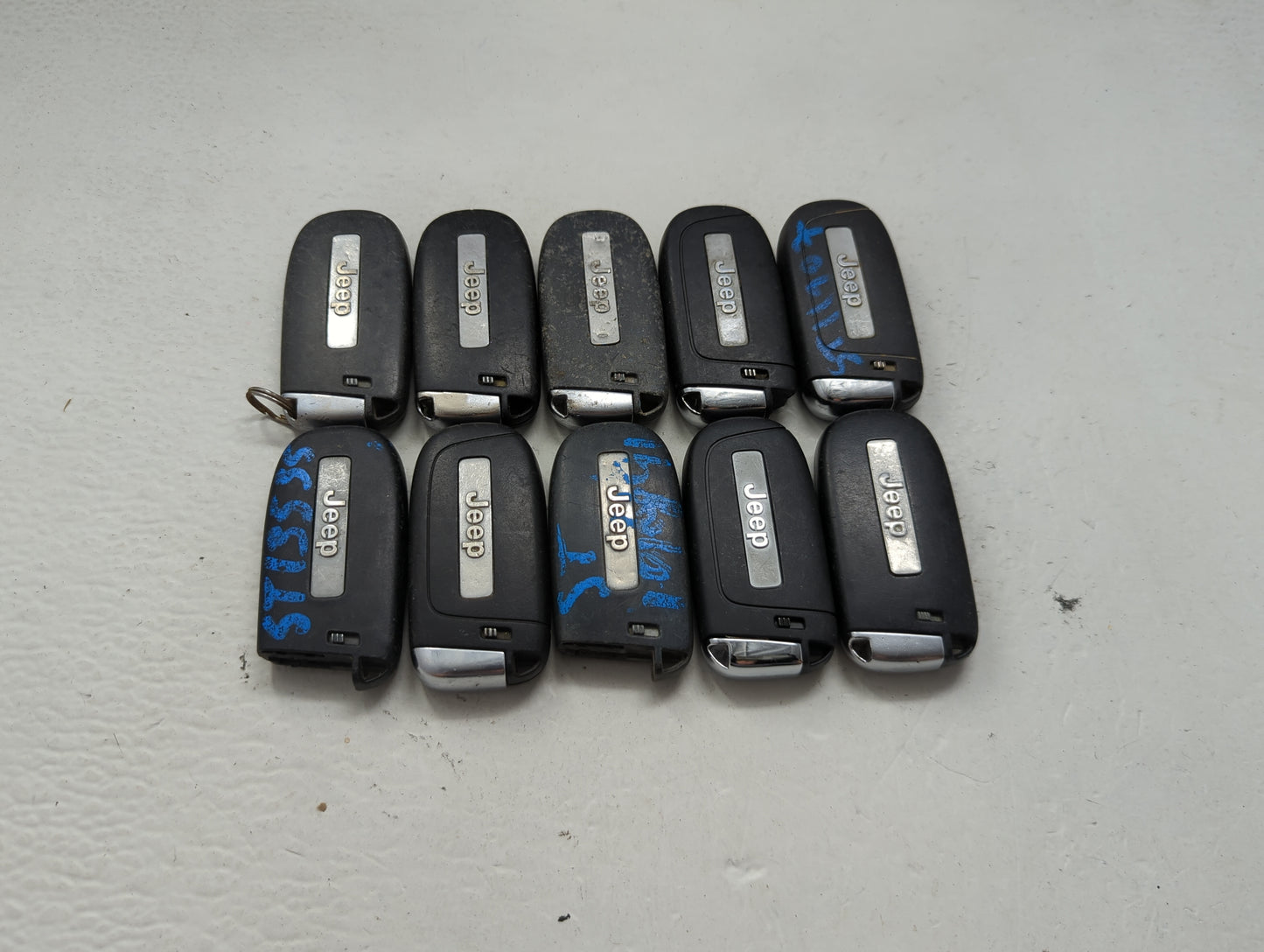 Lot of 10 Jeep Keyless Entry Remote Fob MIXED FCC IDS MIXED PART NUMBERS 1475800 - Oemusedautoparts1.com
