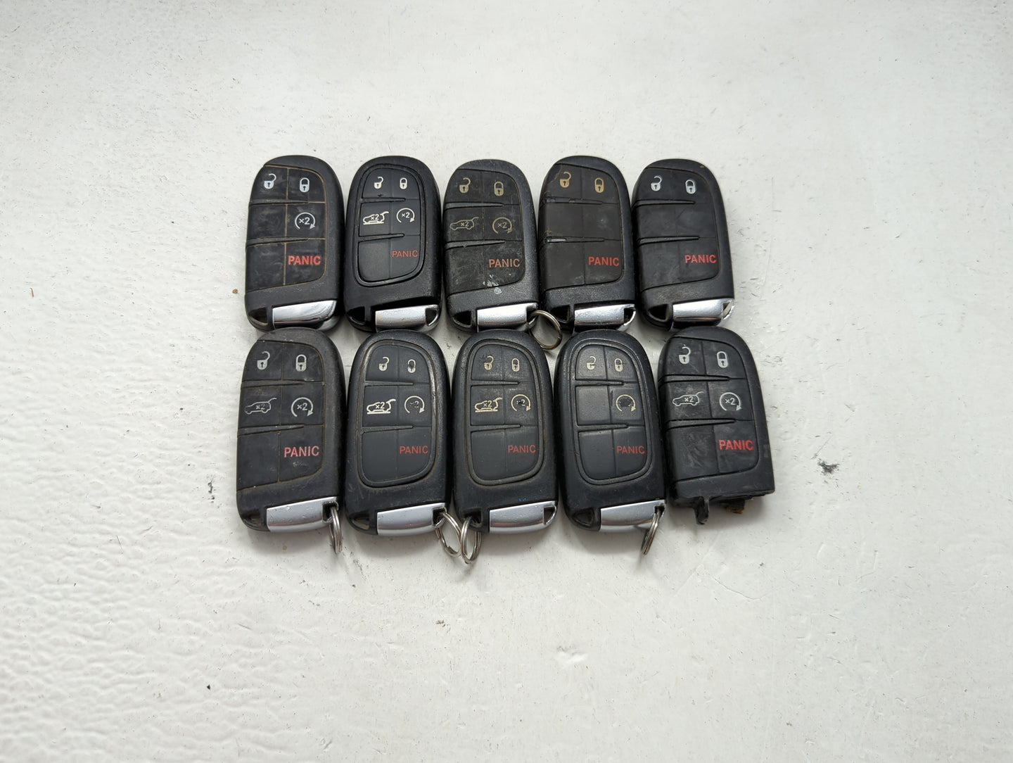 Lot of 10 Jeep Keyless Entry Remote Fob MIXED FCC IDS MIXED PART NUMBERS 1475801 - Oemusedautoparts1.com