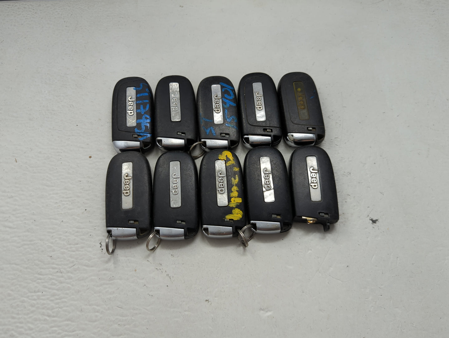 Lot of 10 Jeep Keyless Entry Remote Fob MIXED FCC IDS MIXED PART NUMBERS 1475801 - Oemusedautoparts1.com