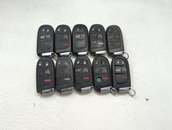 compare product Lot of 10 Jeep Keyless Entry Remote Fob MIXED FCC IDS MIXED PART NUMBERS 1475802