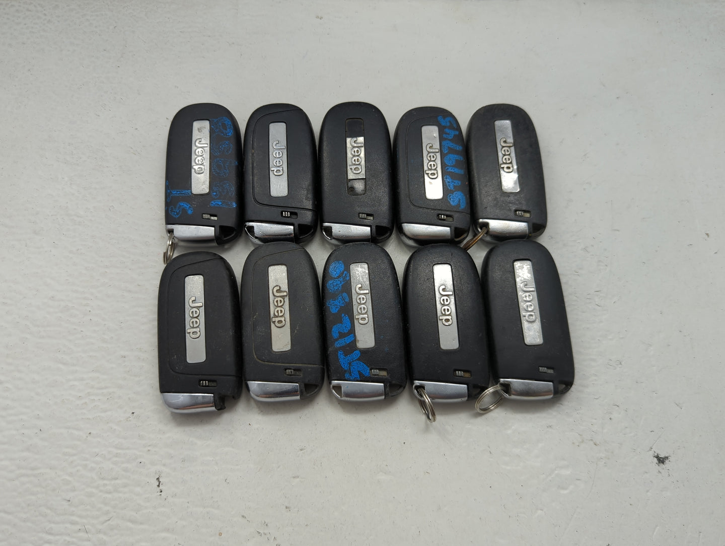 Lot of 10 Jeep Keyless Entry Remote Fob MIXED FCC IDS MIXED PART NUMBERS 1475802 - Oemusedautoparts1.com
