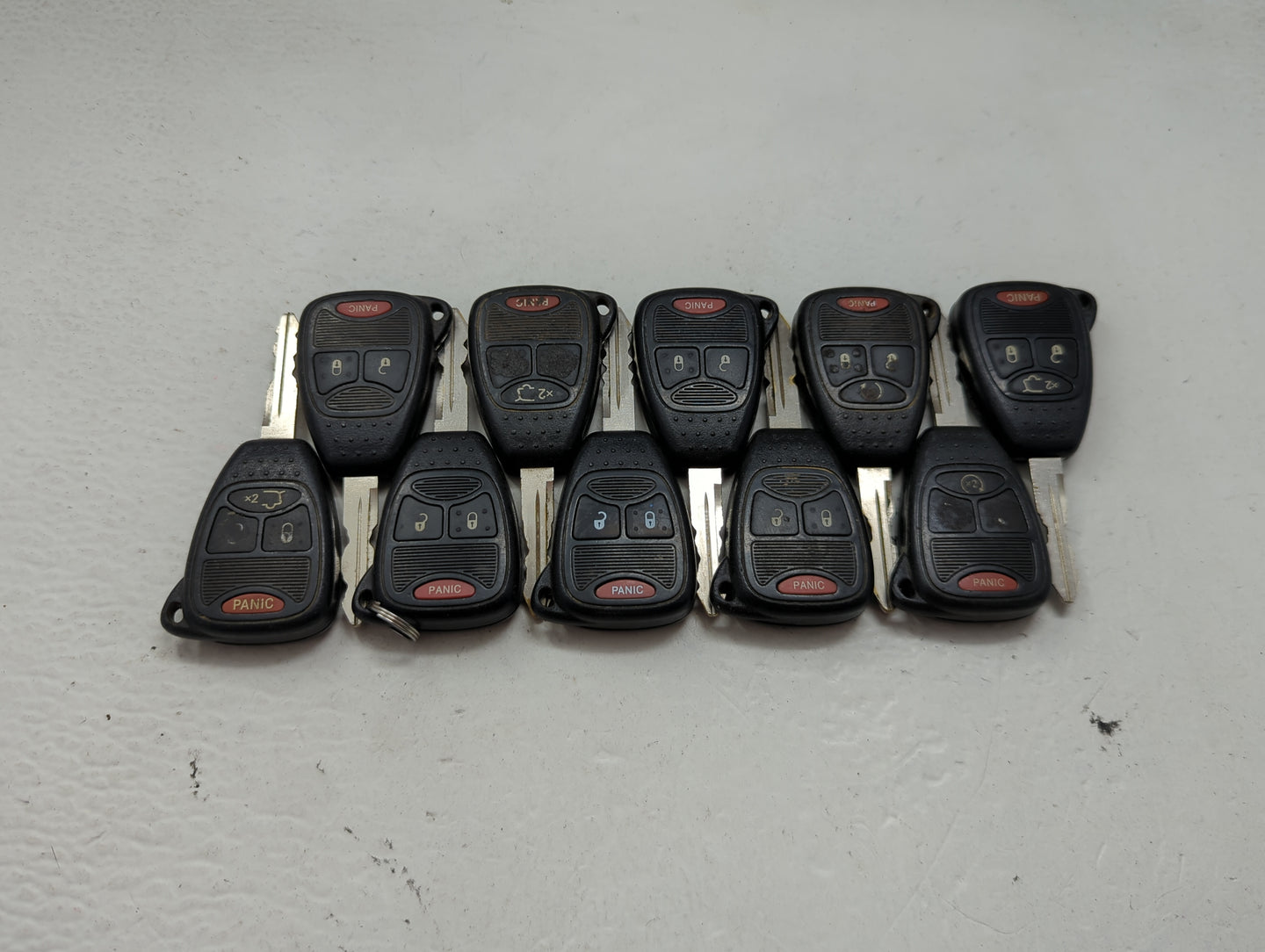 Lot of 10 Jeep Keyless Entry Remote Fob MIXED FCC IDS MIXED PART NUMBERS 1476530 - Oemusedautoparts1.com