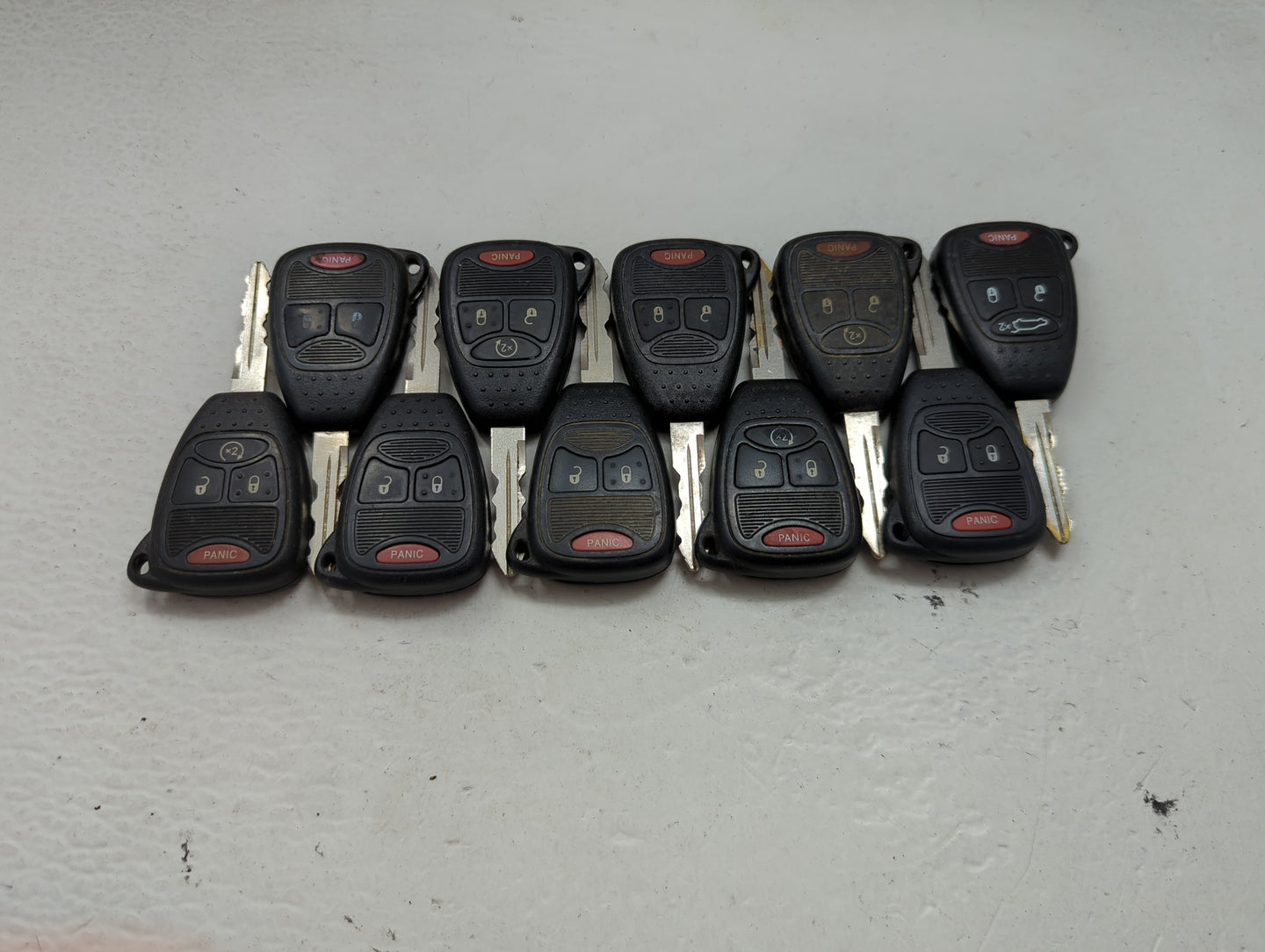 Lot of 10 Jeep Keyless Entry Remote Fob MIXED FCC IDS MIXED PART NUMBERS 1476533 - Oemusedautoparts1.com