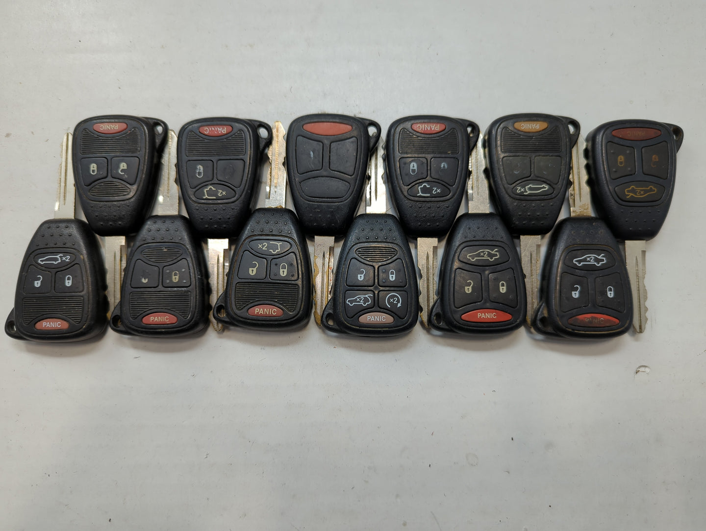 Lot of 12 Jeep Keyless Entry Remote Fob MIXED FCC IDS MIXED PART NUMBERS - Oemusedautoparts1.com