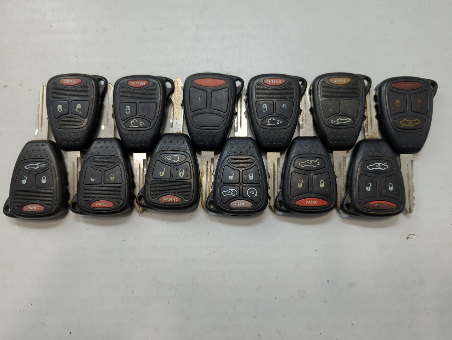 Lot of 12 Jeep Keyless Entry Remote Fob MIXED FCC IDS MIXED PART NUMBERS - Oemusedautoparts1.com
