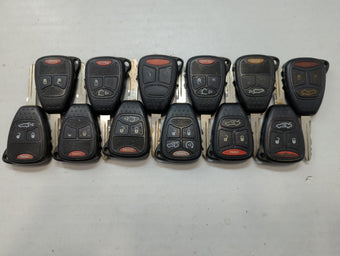 compare product Lot of 12 Jeep Keyless Entry Remote Fob MIXED FCC IDS MIXED PART NUMBERS